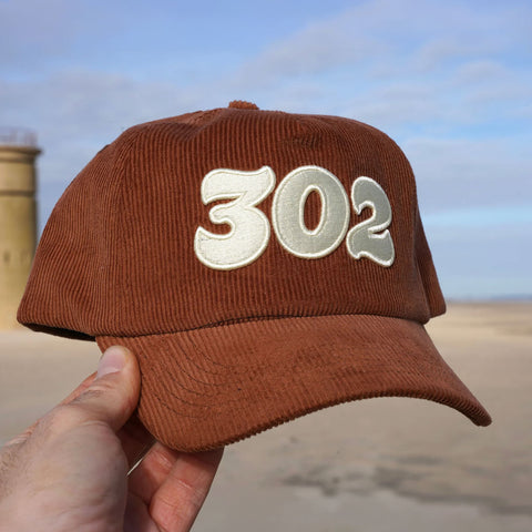 Delaware Beaches Suck 302 Brown Hat in brown