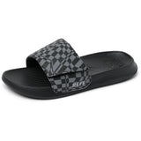 Reef kids Kids Salty Slide Sandals in black swell checker