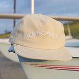 Delaware Beaches Suck DBS Coastal Rehoboth Hat in sand